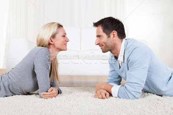 Young couple watching each other Stock photo © AndreyPopov