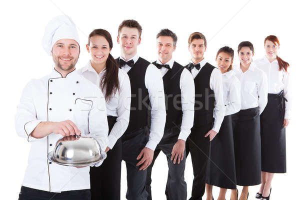 Large group of waiters and waitresses standing in row Stock photo © AndreyPopov