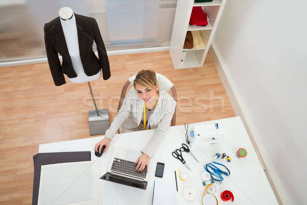 Fashion Designer Using Laptop Stock photo © AndreyPopov