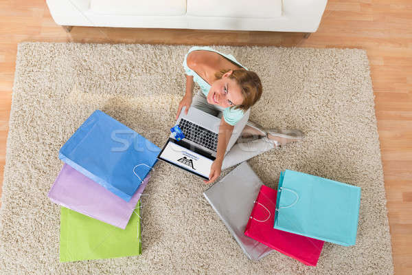 Woman Using Laptop For Online Shopping Stock photo © AndreyPopov