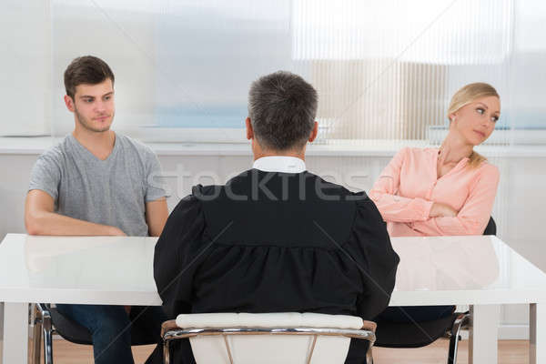 Judge In Front Of A Unhappy Couple Stock photo © AndreyPopov