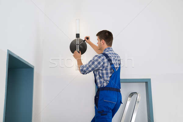 Electrician Repairing Light Stock photo © AndreyPopov