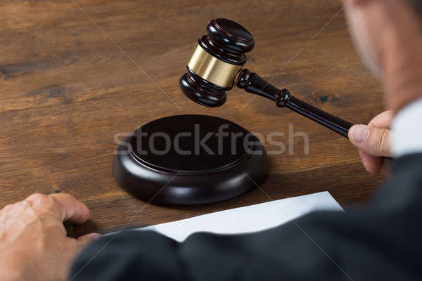 Judge Striking The Gavel At Table Stock photo © AndreyPopov