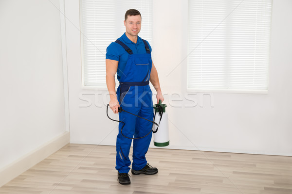 Sonriendo masculina trabajador contenedor casa Foto stock © AndreyPopov