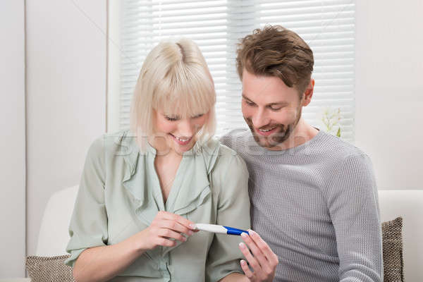 Couple Holding Pregnancy Tester Stock photo © AndreyPopov