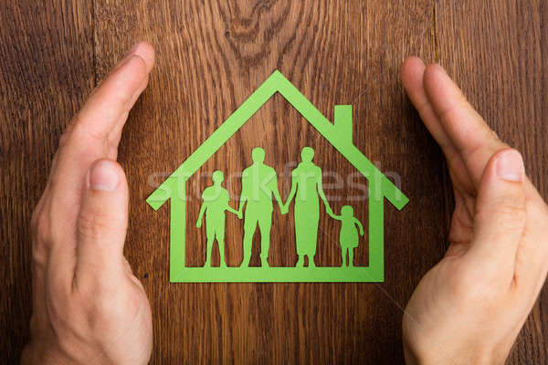 Person Hand Protecting Family Home Stock photo © AndreyPopov