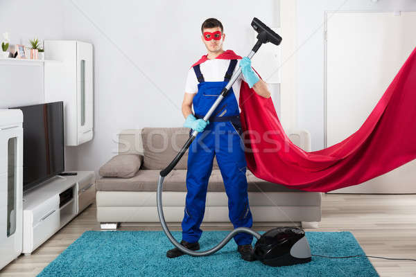 Stock foto: Hausmeister · Reinigung · Teppich · Staubsauger · Wohnzimmer