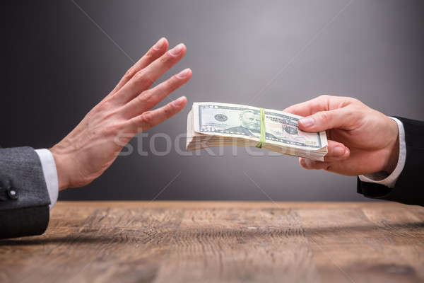 Businessperson Refusing To Take Bribe From Partner Stock photo © AndreyPopov