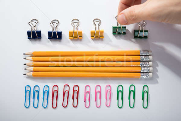 Person Arranging The Pencils On White Background Stock photo © AndreyPopov