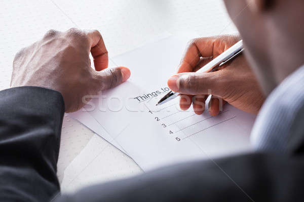 стороны планирования чтобы сделать список бизнесмен бизнеса Сток-фото © AndreyPopov