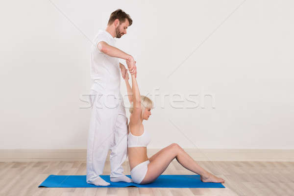 Women At Physio Therapy Session Stock photo © AndreyPopov