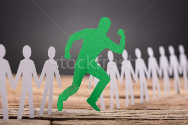 Green Paperman Standing Out Stock photo © AndreyPopov