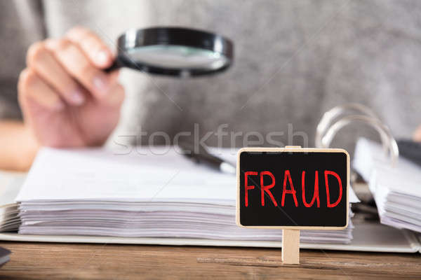 Fraude faible bord bureau femme d'affaires documents [[stock_photo]] © AndreyPopov