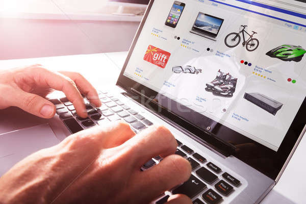 Person Shopping Online On Laptop Stock photo © AndreyPopov