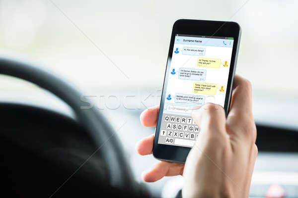 Személyek kéz sms üzenetküldés közelkép bent autó Stock fotó © AndreyPopov