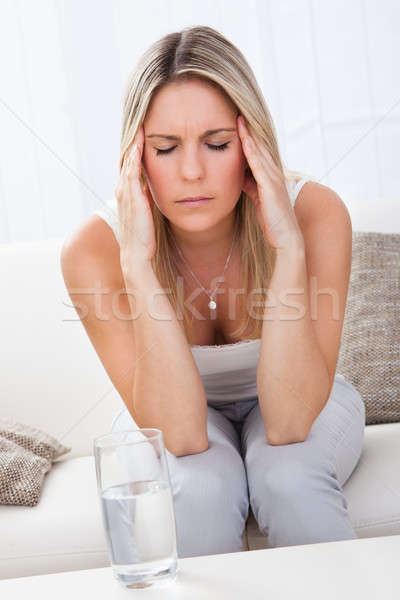 Portrait femme migraine séance eau Photo stock © AndreyPopov