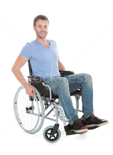 Portret niepełnosprawnych człowiek wózek biały Zdjęcia stock © AndreyPopov