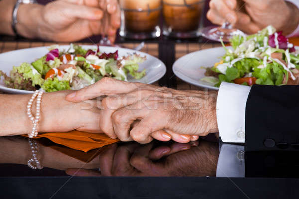 Stock photo: Senior Couple Touching Hands