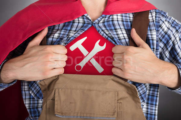Handyman Opening Shirt For Showing Worktools Sign Stock photo © AndreyPopov