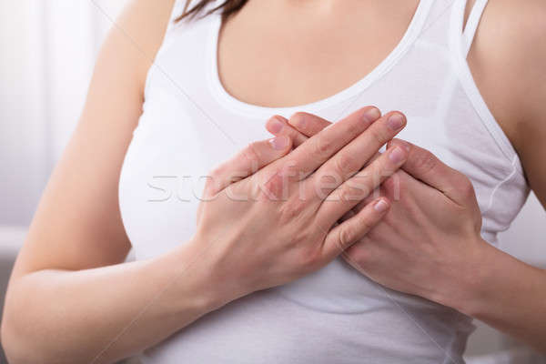 Woman Suffering From Breast Pain Stock photo © AndreyPopov