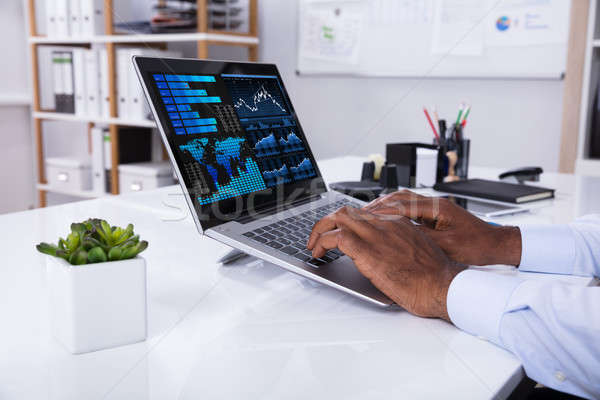 Férfi grafikon laptop közelkép üzletember munkahely Stock fotó © AndreyPopov