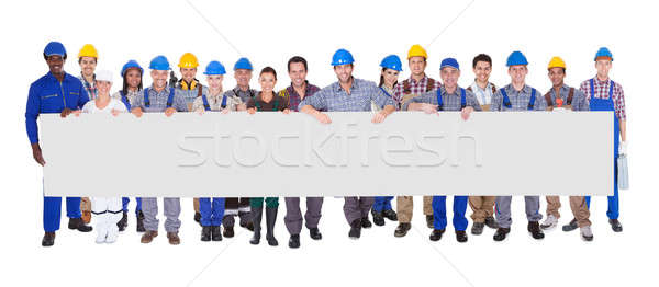 Stock fotó: Csoport · építkezés · munkások · plakát · tart · fehér