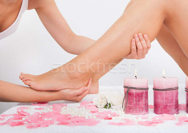 Woman Getting Feet Massage Stock photo © AndreyPopov