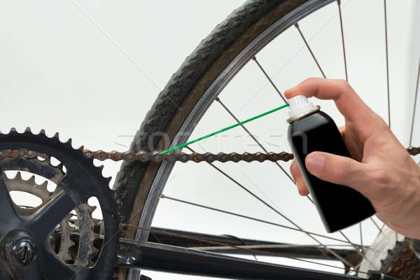 Person Hands Lubricating Bike Stock photo © AndreyPopov