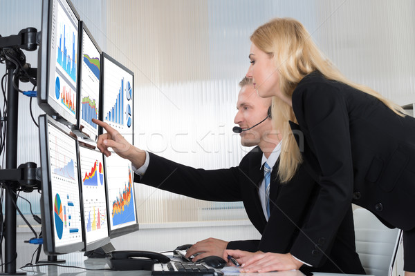 Pénzügyi munkások ellenőrzés számítógép iroda fiatal Stock fotó © AndreyPopov