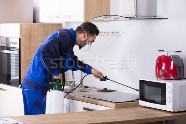 Trabajador cocina uniforme casa hombre Foto stock © AndreyPopov