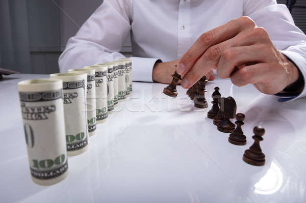 Businessperson Making First Move With Chess Piece Stock photo © AndreyPopov