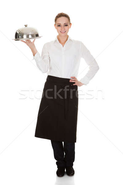 Young Waitress Holding Tray And Lid Stock photo © AndreyPopov