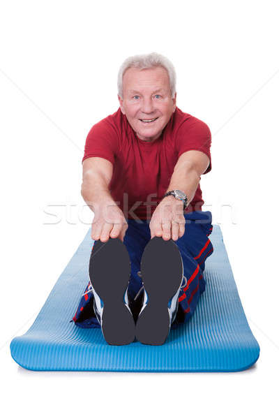 Senior Man Stretching His Legs Stock photo © AndreyPopov