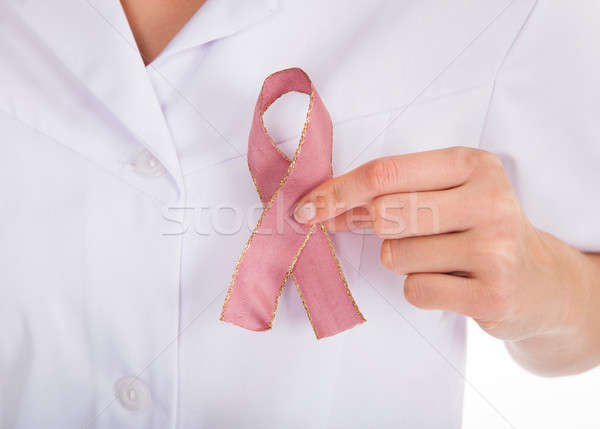 Orvos tart AIDS szimbólum közelkép szalag Stock fotó © AndreyPopov