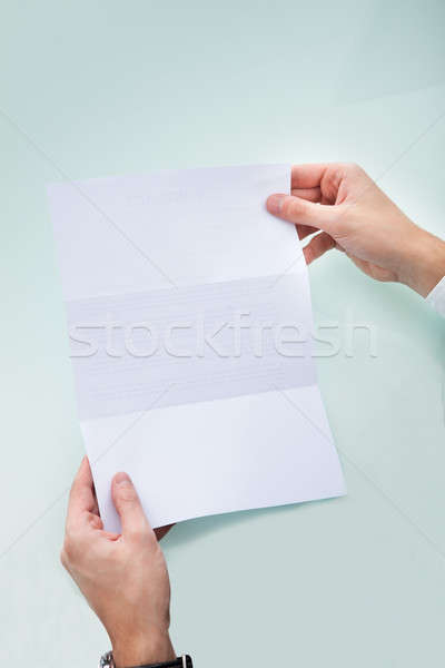 Person's Hand Holding Blank Paper Stock photo © AndreyPopov