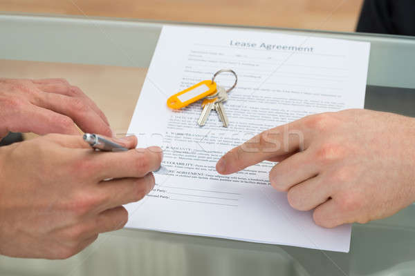 Person Signing Lease Agreement Stock photo © AndreyPopov