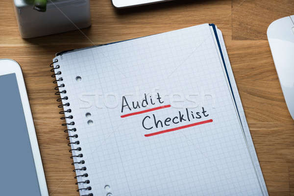 Audit Checklist Written On Notepad At Office Desk Stock photo © AndreyPopov