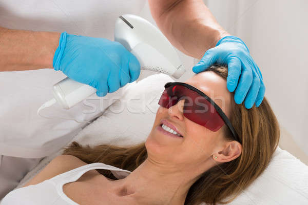 Nő fogad lézer epiláció szépség klinika Stock fotó © AndreyPopov