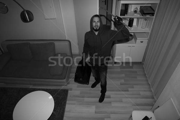 Robber Trying to Break CCTV Camera Stock photo © AndreyPopov