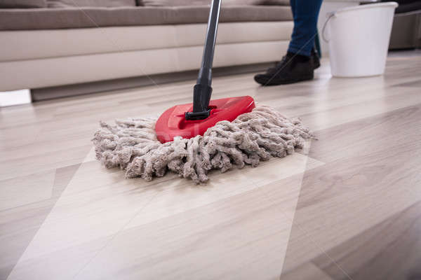 Person Cleaning Floor With Mop Stock photo © AndreyPopov