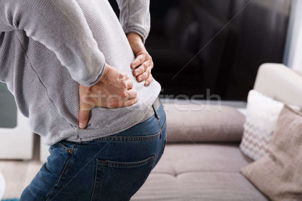 Stockfoto: Man · lijden · rugpijn · home