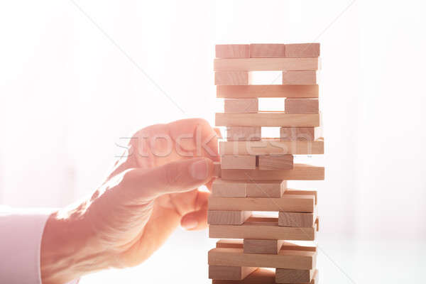 Businessman Stacking Wooden Blocks Stock photo © AndreyPopov