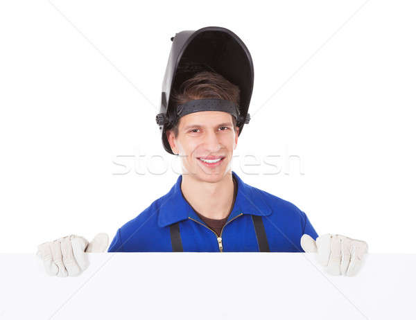 Male Welder Holding Placard Stock photo © AndreyPopov