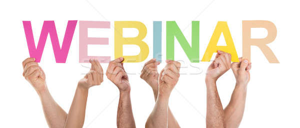 Many People Holding The Colorful Word Webinar Stock photo © AndreyPopov