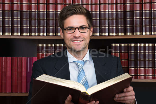 Advocate Reading Book At Courtroom Stock photo © AndreyPopov