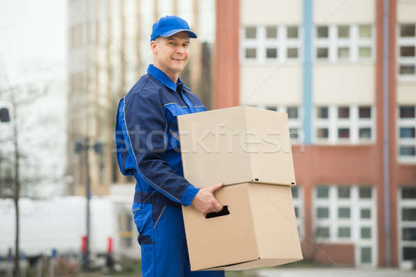 Stock foto: Tragen · Karton · reifen · glücklich · Gebäude