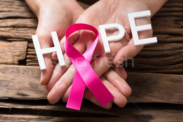 Hand Showing Pink Ribbon With Hope Text Stock photo © AndreyPopov