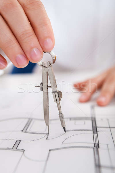 Architect working on blueprints Stock photo © AndreyPopov