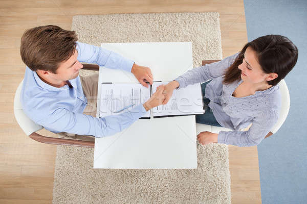 Female Candidate Shaking Hand With Businessman In Office Stock photo © AndreyPopov