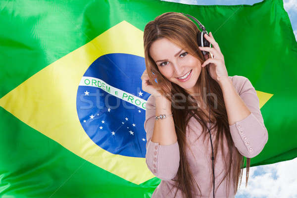 Woman Listening Brazilian Language Audiobook Stock photo © AndreyPopov